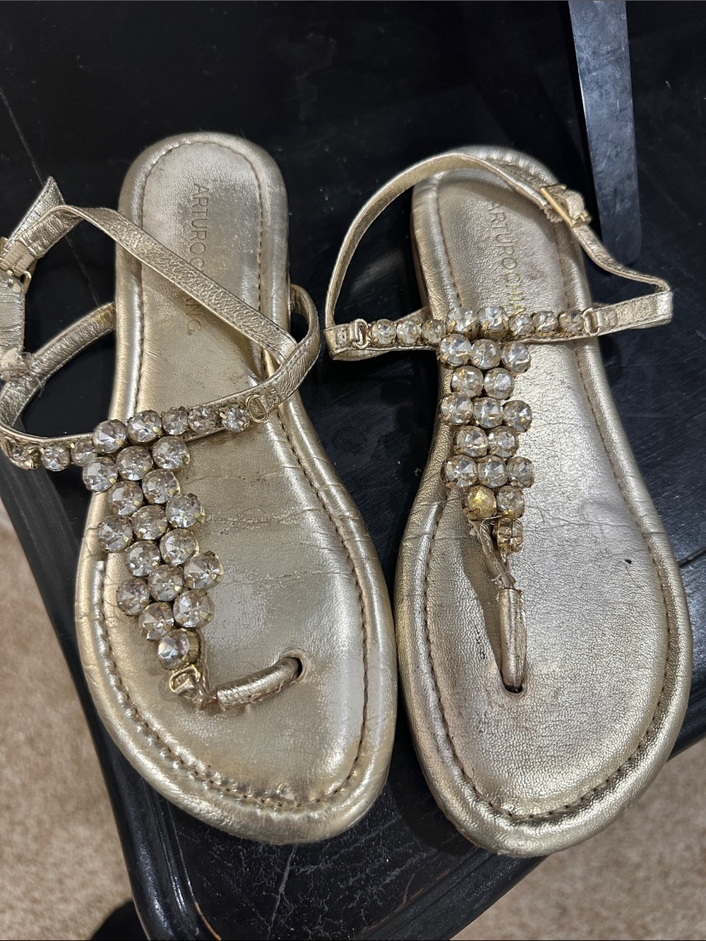 Arturo Chiang Womenโs Gold Jeweled T-Strap Sandals
